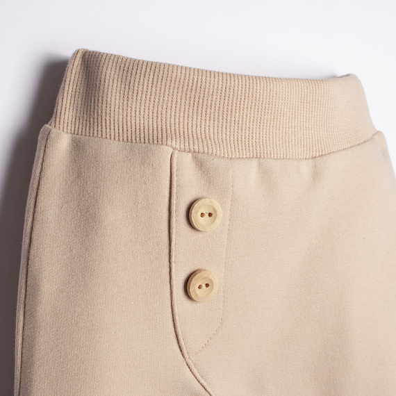 221273 Kiku Nicol pantaloni tuta beige per neonati con bottoni